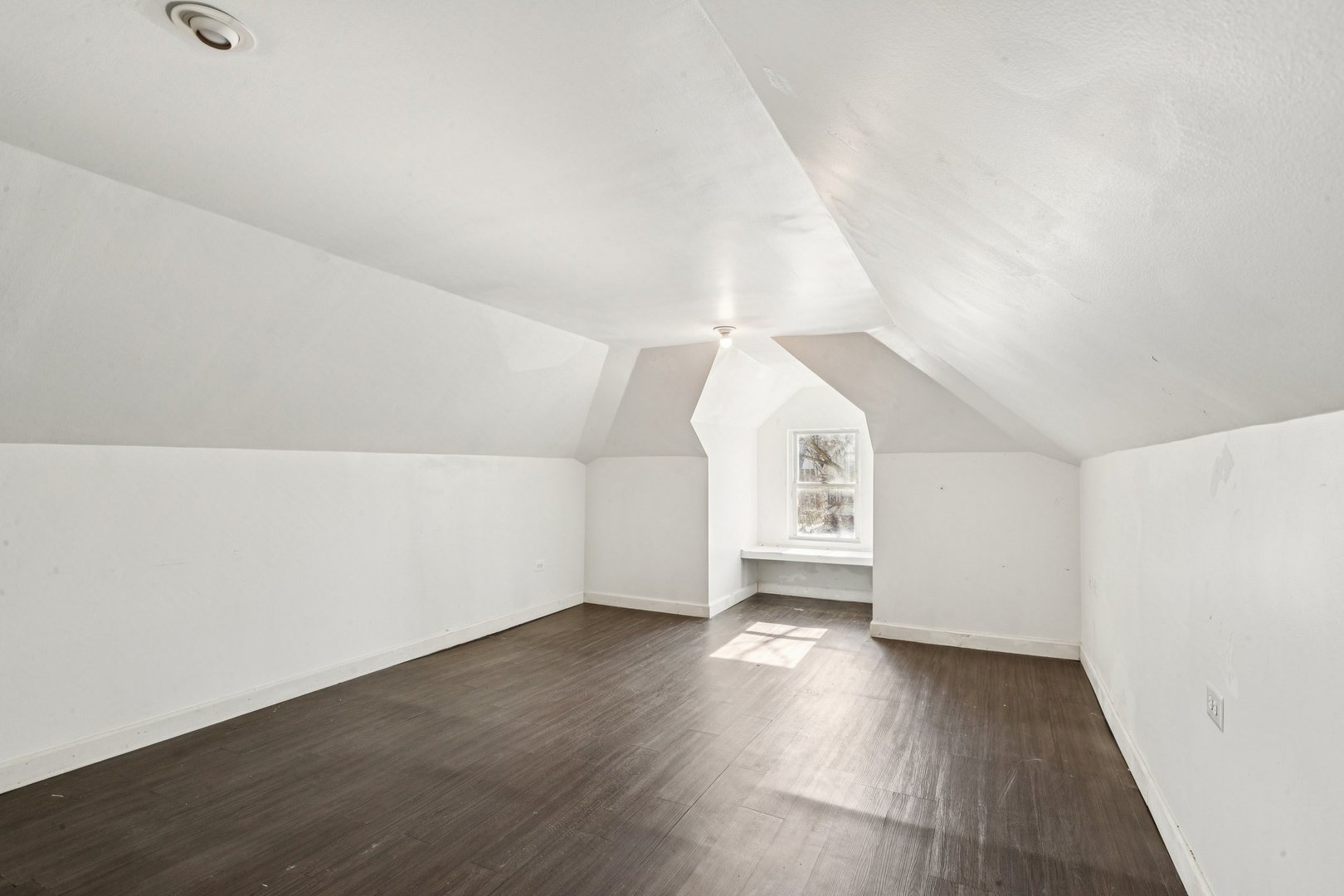 2115 Emerson Street Evanston, IL 60201 - Photo 20 of 37 a view of an empty room with wooden floor