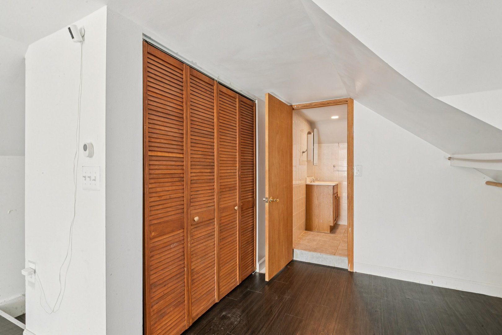 2115 Emerson Street Evanston, IL 60201 - Photo 22 of 37 a view of a hallway with wooden floor