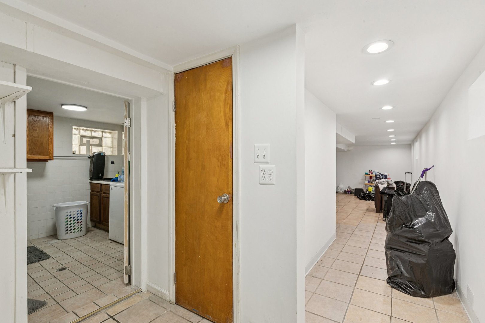 2115 Emerson Street Evanston, IL 60201 - Photo 25 of 37 a view of a hallway and a livingroom with furniture
