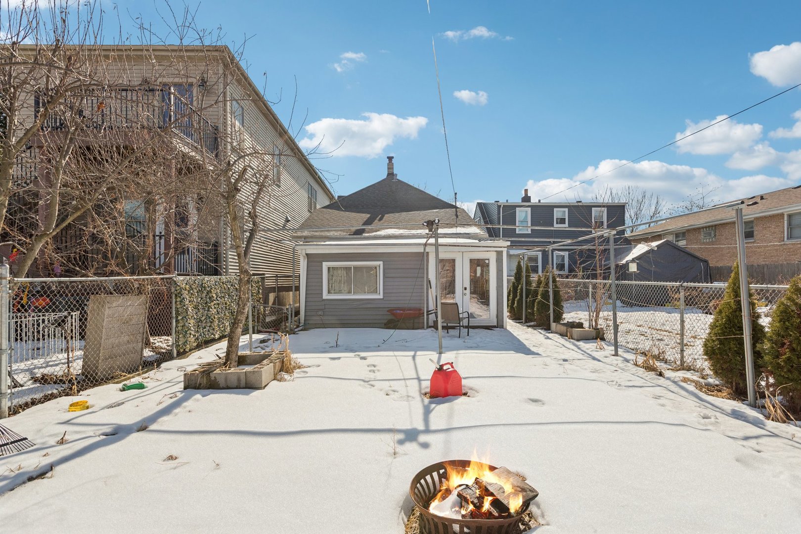 2115 Emerson Street Evanston, IL 60201 - Photo 35 of 37 a view of a street with wooden fence