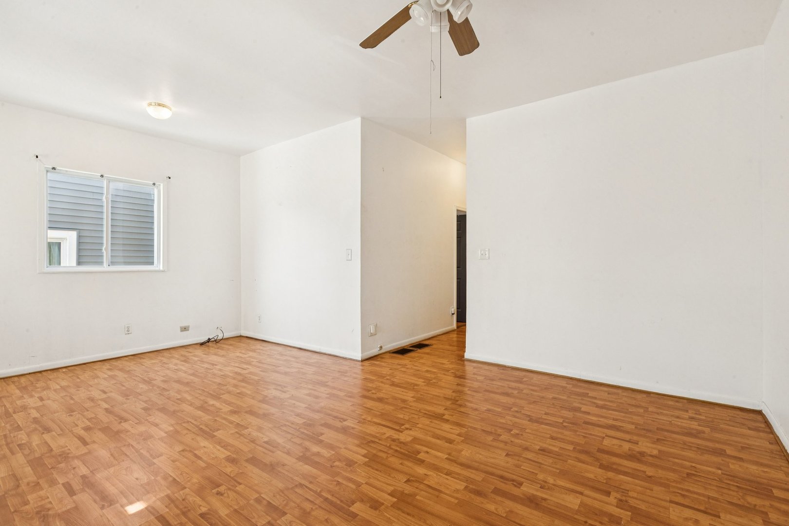 2115 Emerson Street Evanston, IL 60201 - Photo 5 of 37 a view of an empty room with a window