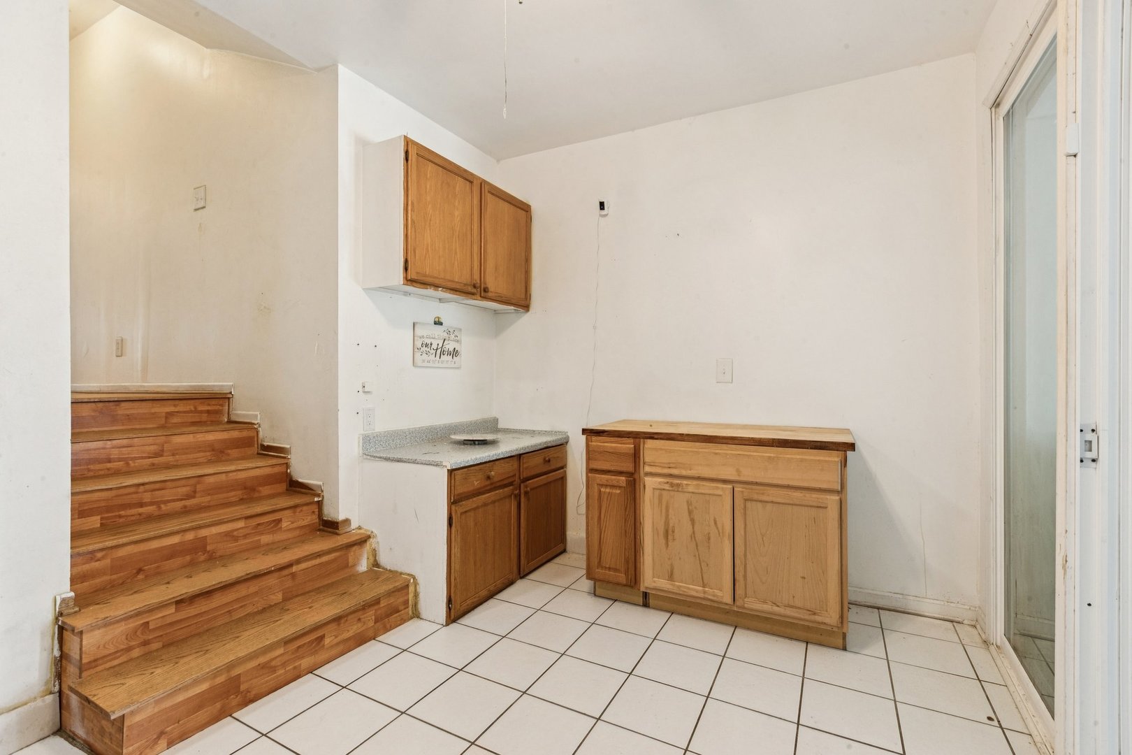 2115 Emerson Street Evanston, IL 60201 - Photo 8 of 37 a kitchen with cabinets and stove