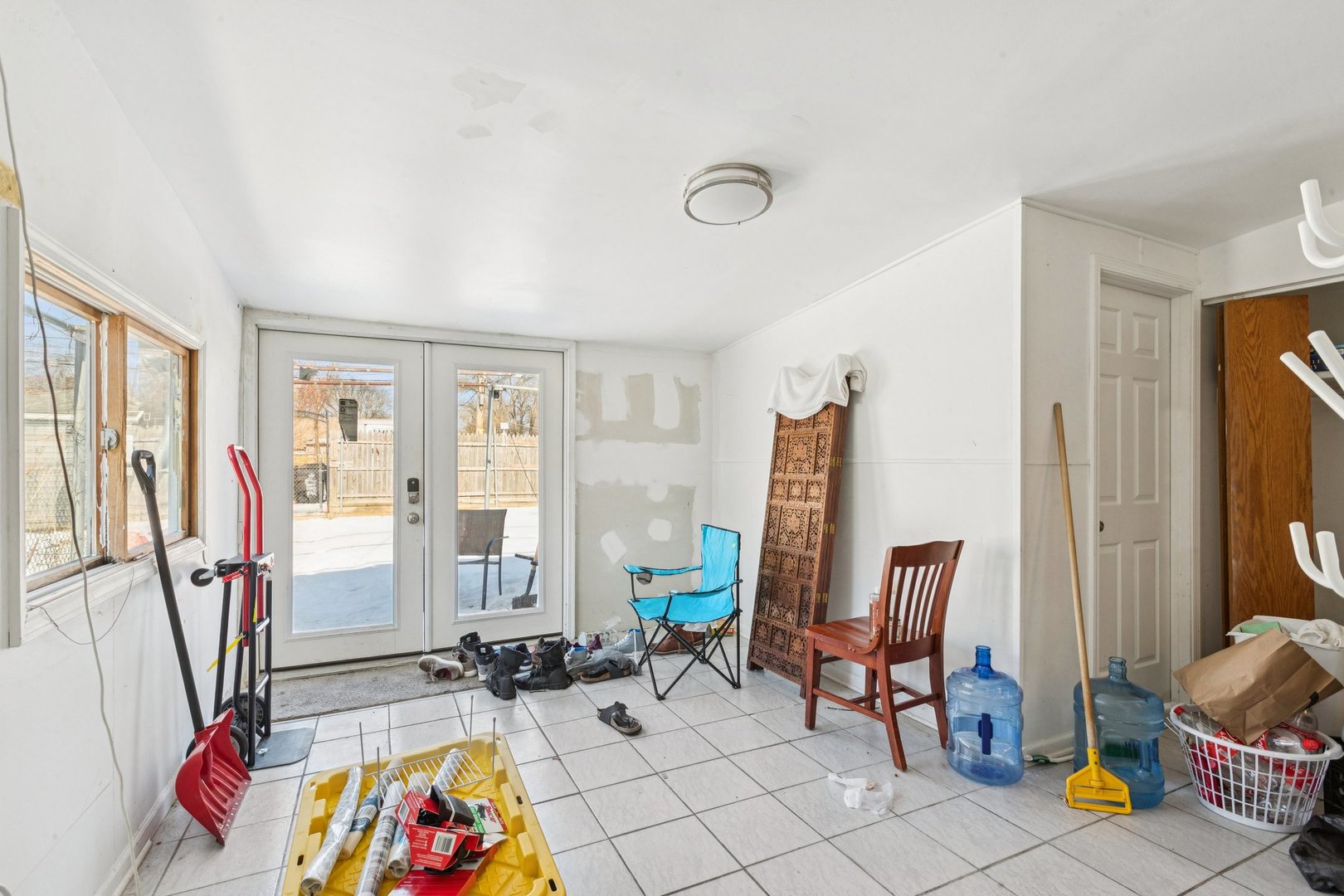 2115 Emerson Street Evanston, IL 60201 - Photo 9 of 37 a living room with furniture and a flat screen tv