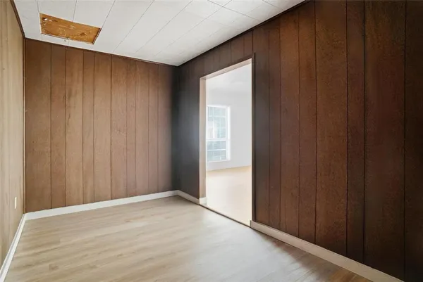 a view of wooden floor and closet
