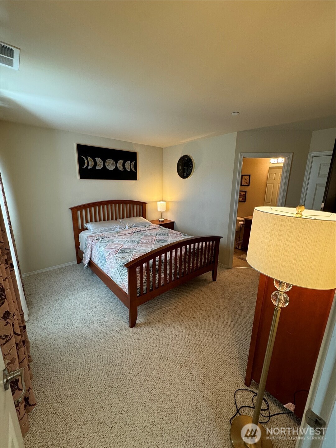 1175 Swan Loop DuPont, WA 98327 - Photo 12 of 34 a bedroom with a bed and a desk