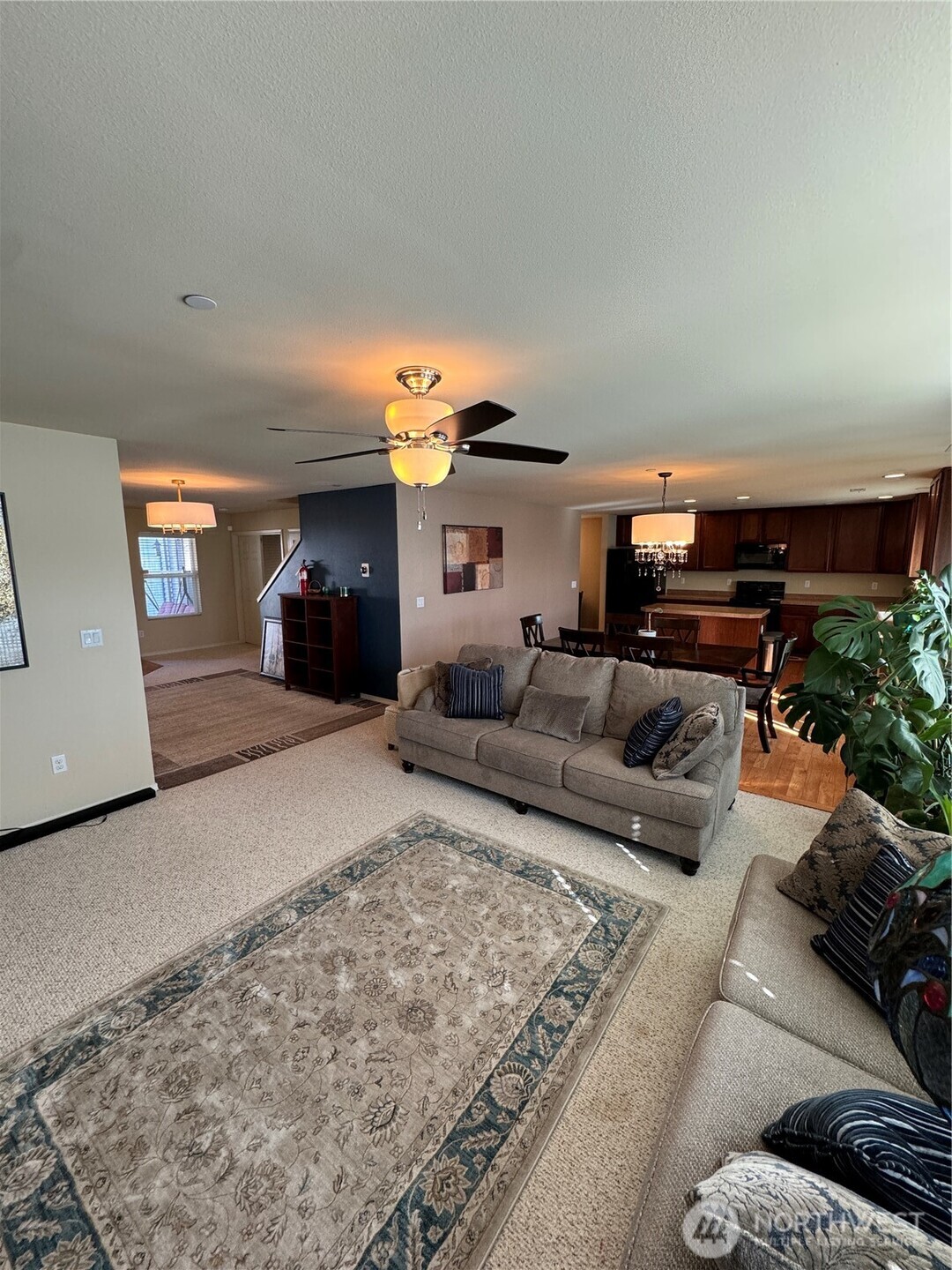 1175 Swan Loop DuPont, WA 98327 - Photo 15 of 34 a living room with furniture and a couch