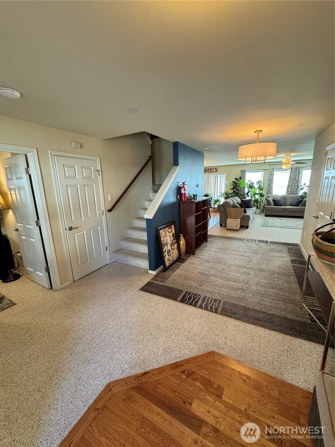 1175 Swan Loop DuPont, WA 98327 - Photo 2 of 34 a view of a livingroom with furniture and a garage