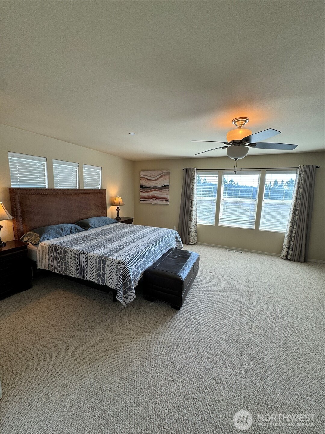 1175 Swan Loop DuPont, WA 98327 - Photo 27 of 34 a bedroom with a bed and window