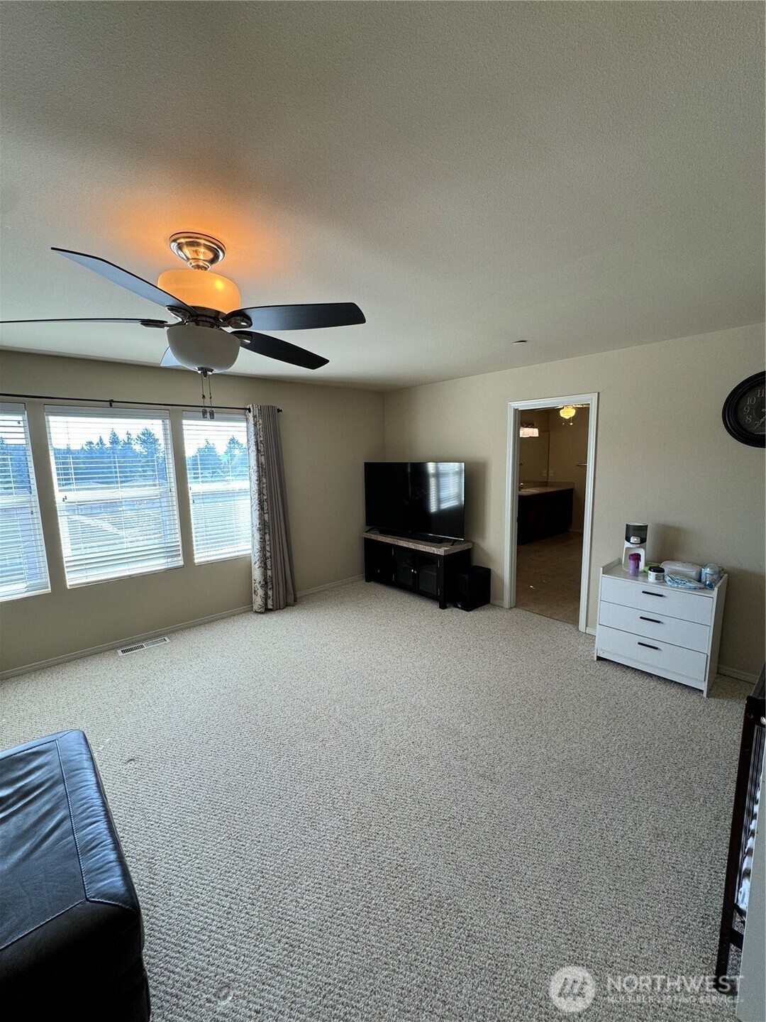 1175 Swan Loop DuPont, WA 98327 - Photo 28 of 34 a living room with furniture and a window