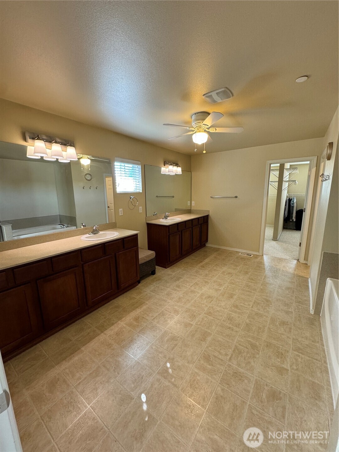 1175 Swan Loop DuPont, WA 98327 - Photo 29 of 34 a large bathroom with a large tub and sink