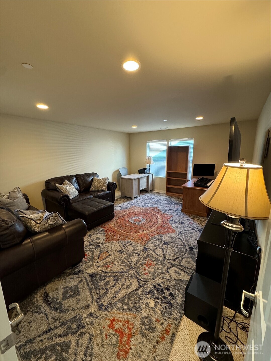 1175 Swan Loop DuPont, WA 98327 - Photo 3 of 34 a bed room with bed and mirror