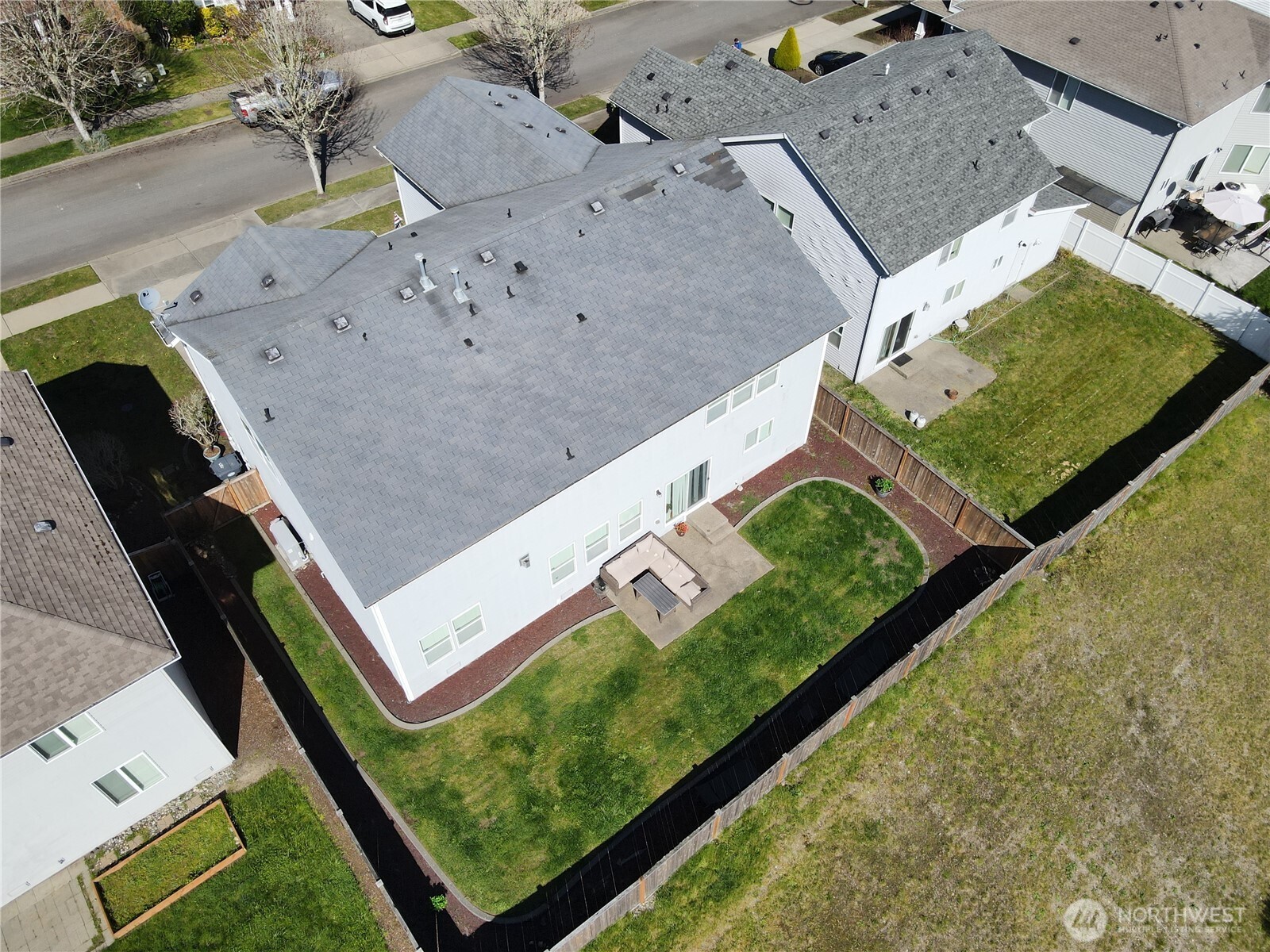 1175 Swan Loop DuPont, WA 98327 - Photo 33 of 34 an aerial view of a pool and chairs