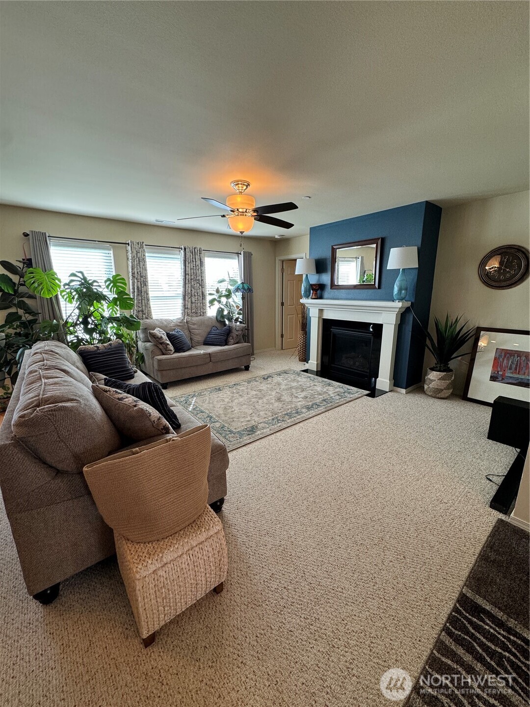 1175 Swan Loop DuPont, WA 98327 - Photo 4 of 34 a living room with furniture and a fireplace