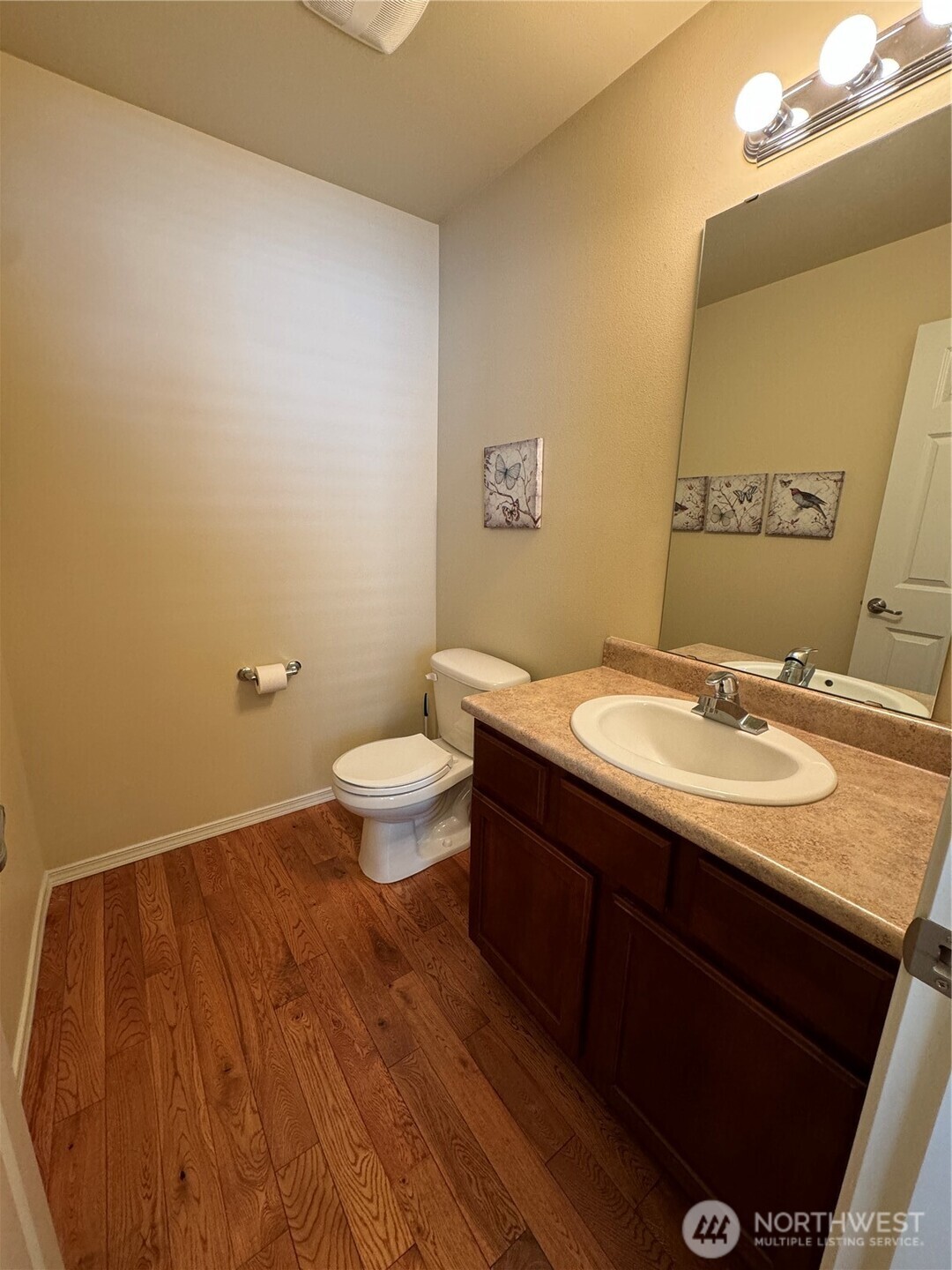 1175 Swan Loop DuPont, WA 98327 - Photo 9 of 34 a bathroom with a sink and a mirror