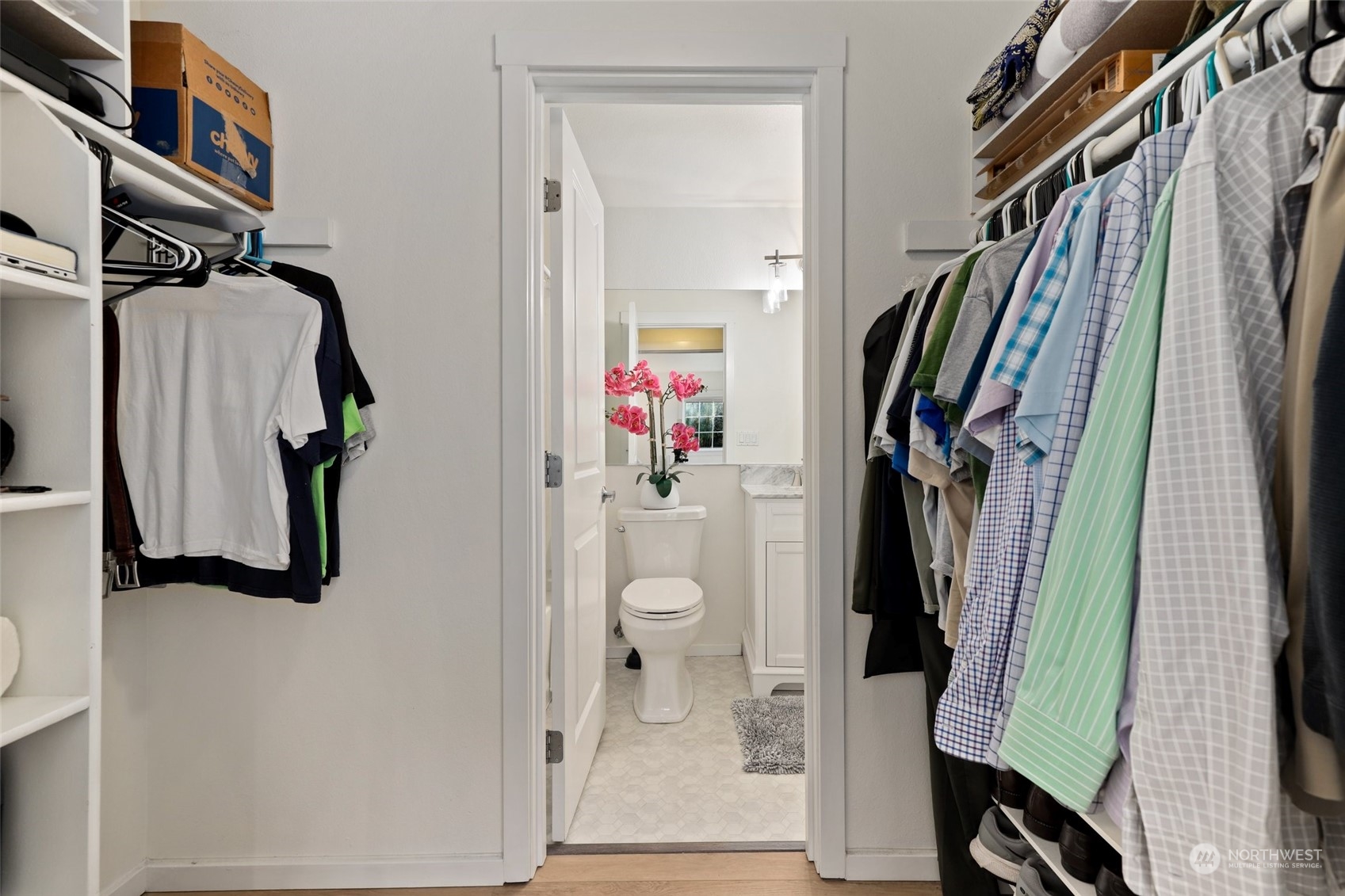 12404 East Gibson Road, Unit J103 Everett, WA 98204 - Photo 20 of 40 a view of walk in closet with clothes and shoes
