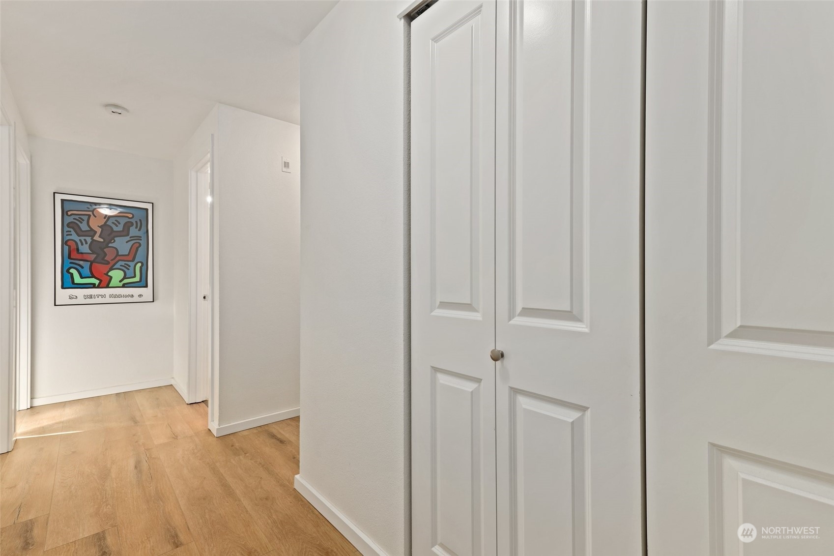 12404 East Gibson Road, Unit J103 Everett, WA 98204 - Photo 5 of 40 a view of a hallway with wooden floor