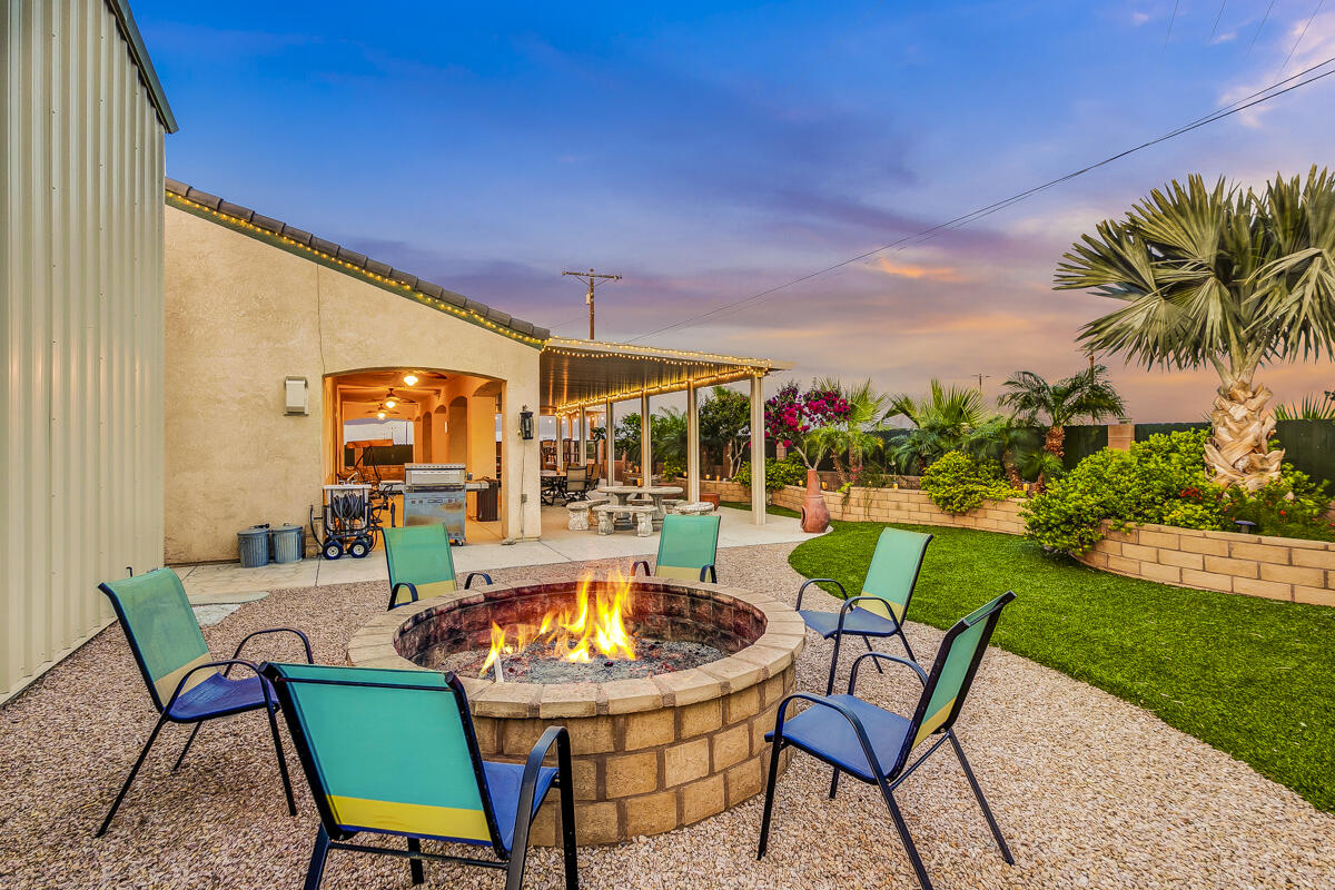 2902 Treadwell Boulevard Thermal, CA 92274 - Photo 28 of 88 a view of an outdoor dining space with a table and chairs