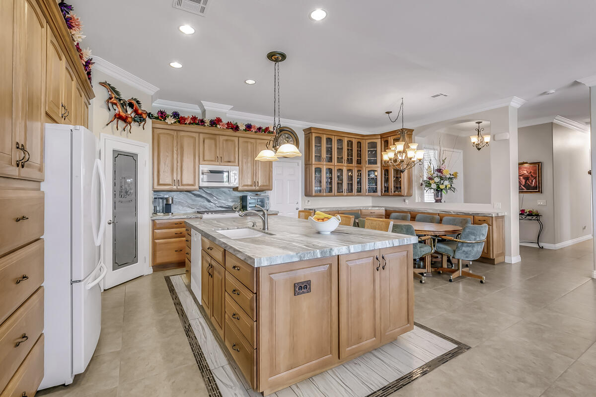 2902 Treadwell Boulevard Thermal, CA 92274 - Photo 42 of 88 a kitchen with a sink stove and cabinets