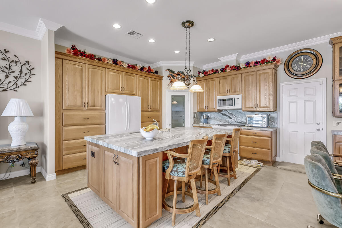 2902 Treadwell Boulevard Thermal, CA 92274 - Photo 43 of 88 a kitchen with stainless steel appliances granite countertop a stove and a sink