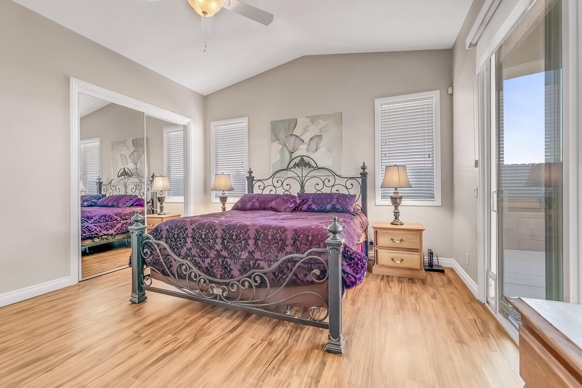 2902 Treadwell Boulevard Thermal, CA 92274 - Photo 55 of 88 a bedroom with a bed and wooden floor