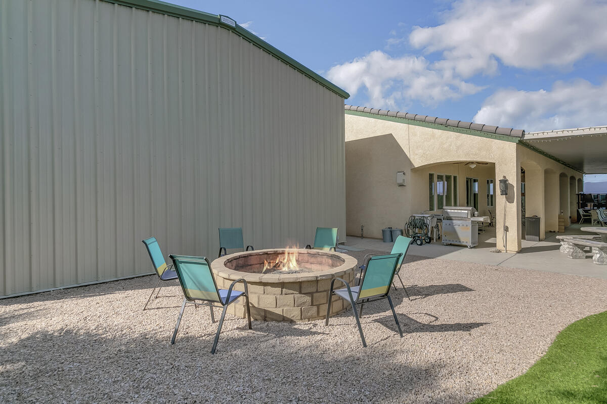 2902 Treadwell Boulevard Thermal, CA 92274 - Photo 58 of 88 a view of a patio with a table and chairs