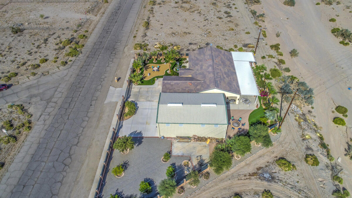 2902 Treadwell Boulevard Thermal, CA 92274 - Photo 80 of 88 an aerial view of a house with a yard