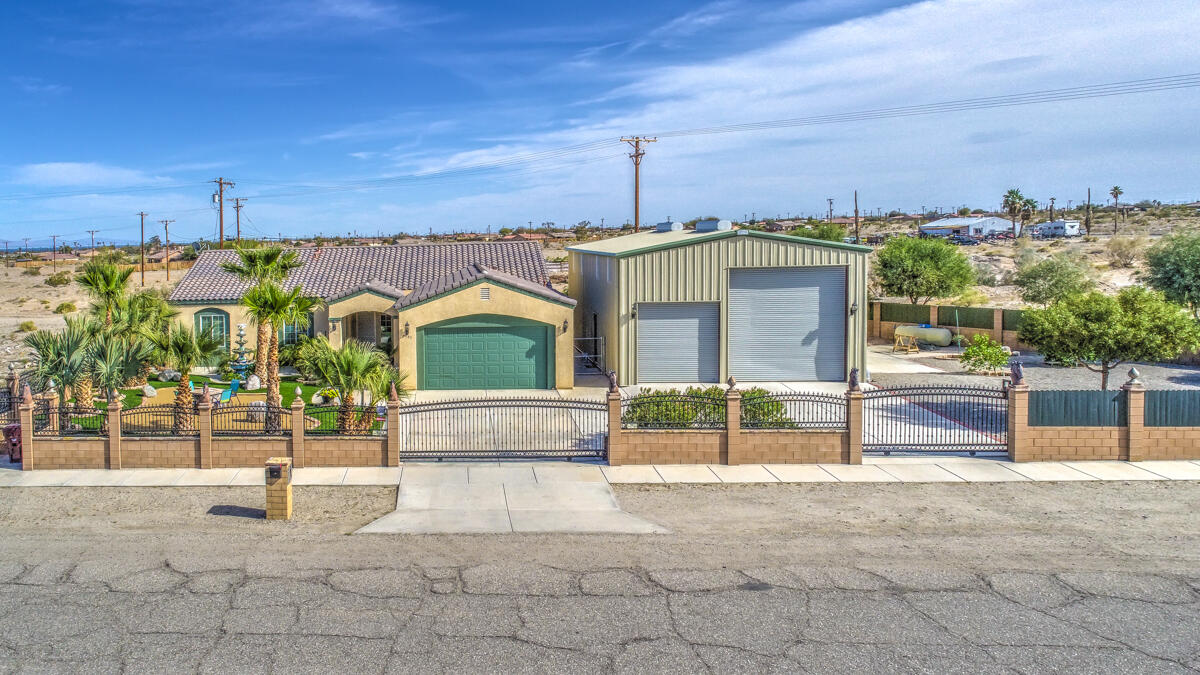 2902 Treadwell Boulevard Thermal, CA 92274 - Photo 88 of 88 a view of a house with a floor to ceiling windows