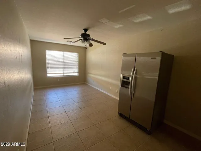 a spacious bathroom with a tub and a shower