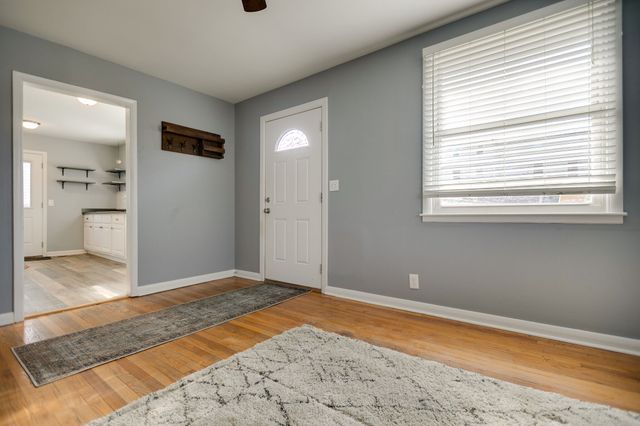 a view of an empty room and window