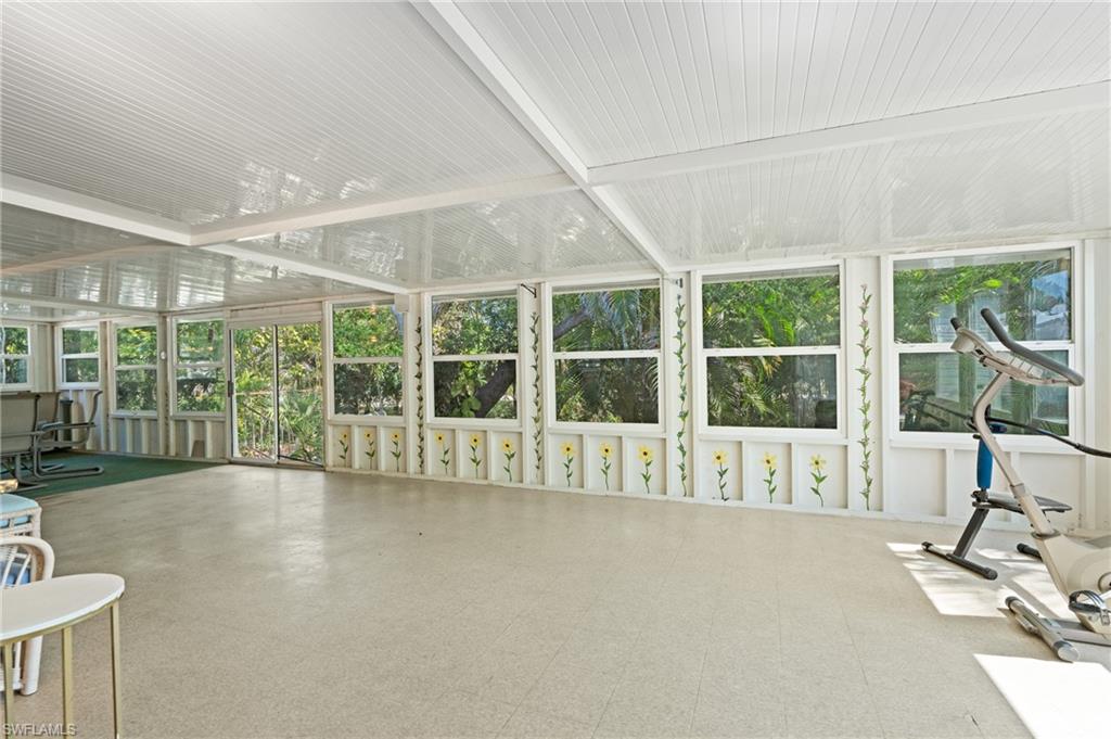 278 Riverwood Road Naples, FL 34114 - Photo 28 of 43 View of unfurnished sunroom