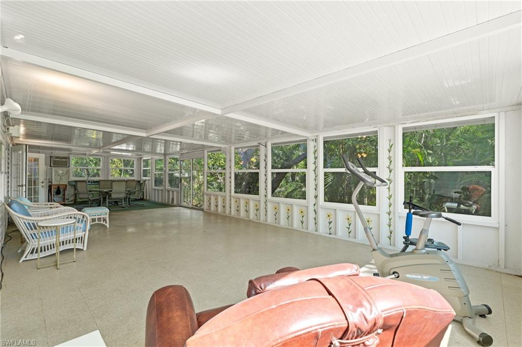 278 Riverwood Road Naples, FL 34114 - Photo 29 of 43 Sunroom / solarium featuring plenty of natural light