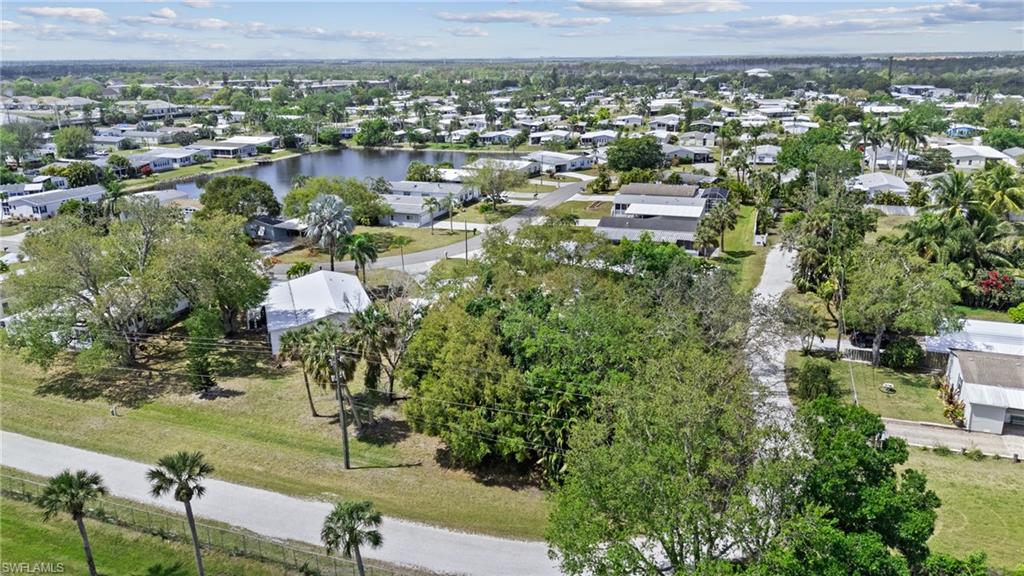278 Riverwood Road Naples, FL 34114 - Photo 39 of 43 Aerial view featuring a residential view and a water view