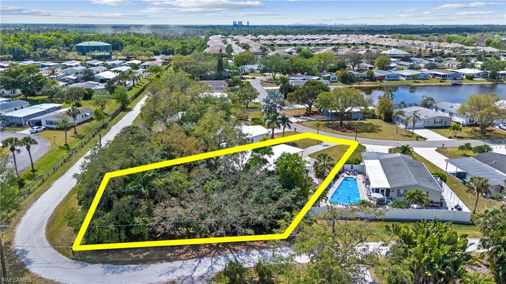 278 Riverwood Road Naples, FL 34114 - Photo 42 of 43 Bird's eye view with a residential view and a water view