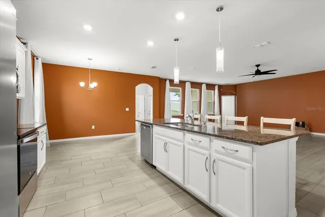 an empty room with closet area