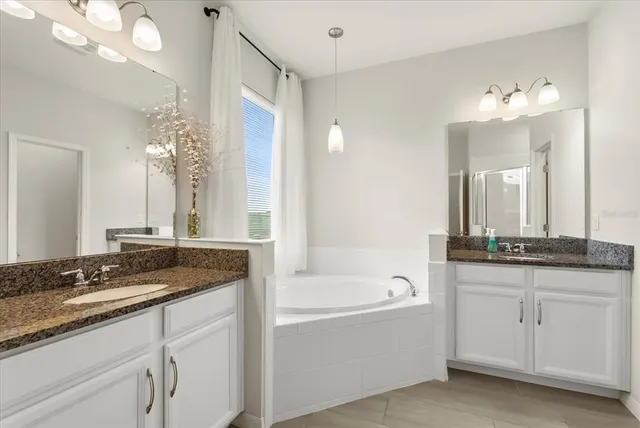 a view of storage and utility room with washer and dryer
