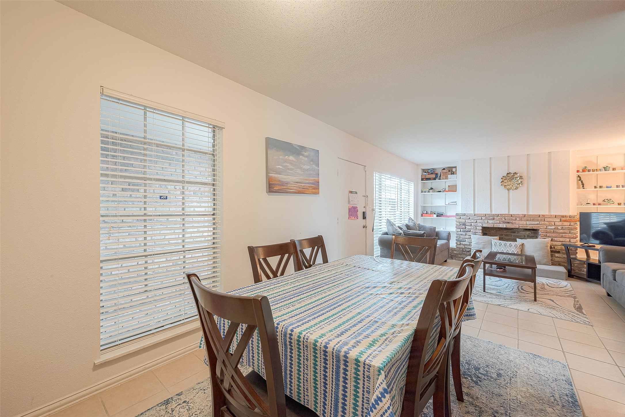 2201 Fountain View Drive, Unit 54 Houston, TX 77057 - Photo 14 of 30 a view of a dining room with furniture
