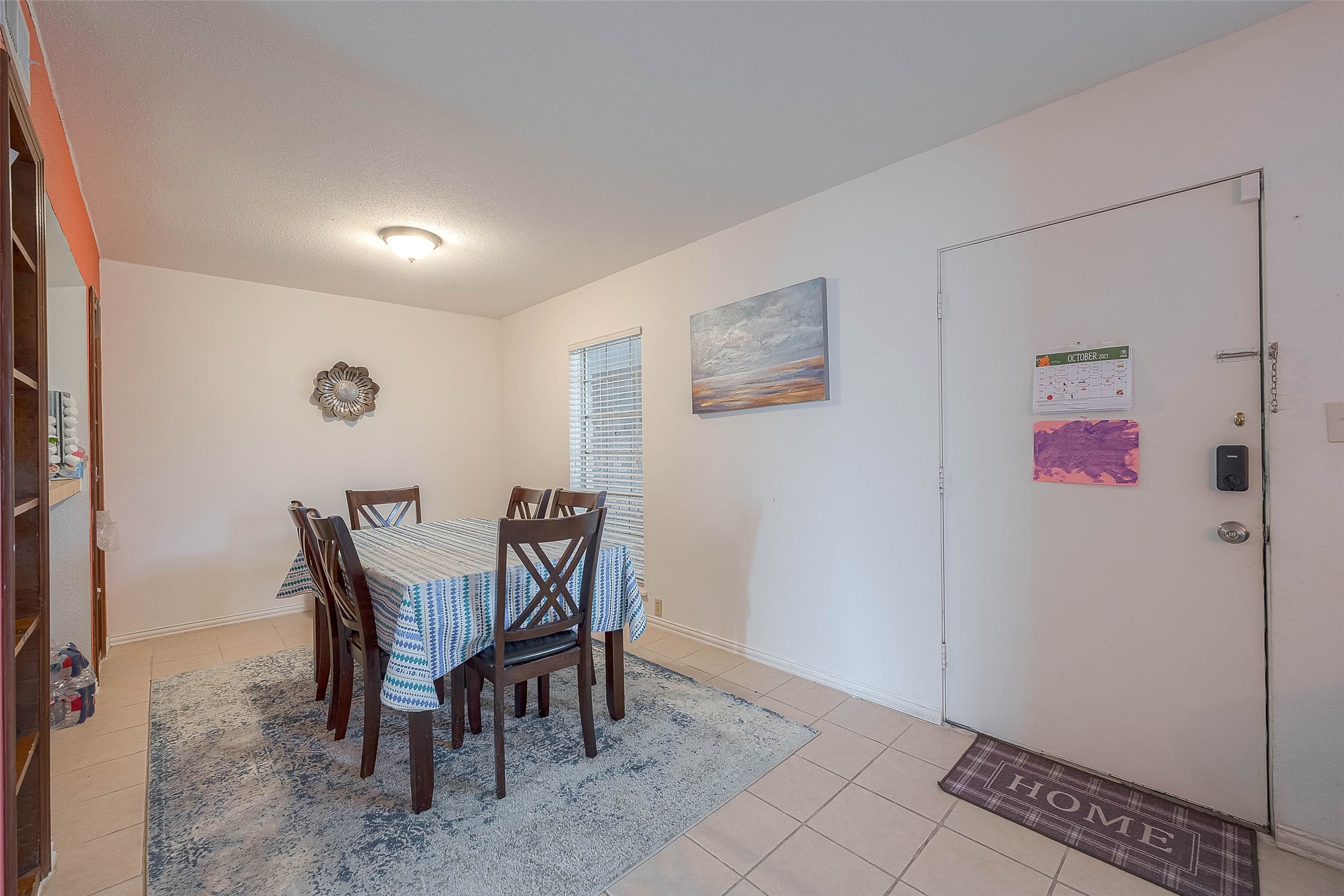 2201 Fountain View Drive, Unit 54 Houston, TX 77057 - Photo 8 of 30 a view of a dining room with furniture