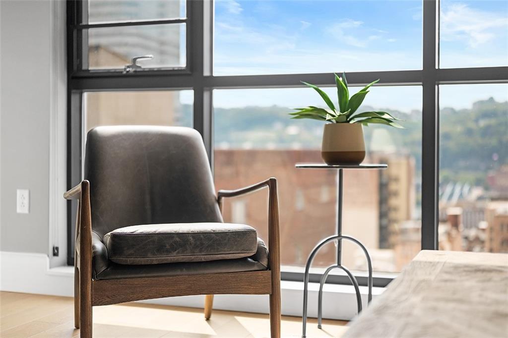 350 Oliver Avenue, Unit 1503 Pittsburgh, PA 15222 - Photo 15 of 43 a balcony with table and chairs