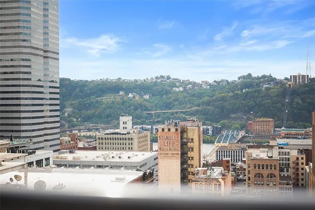 a view of a city with tall buildings