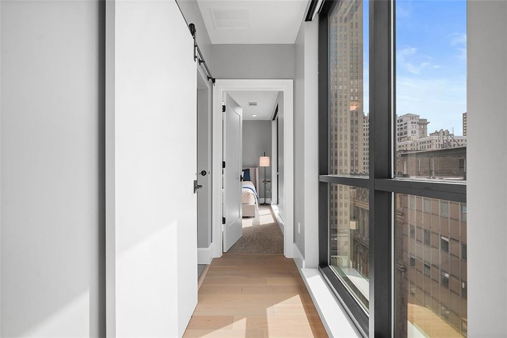 350 Oliver Avenue, Unit 1503 Pittsburgh, PA 15222 - Photo 21 of 43 a view of a bathroom from a hallway