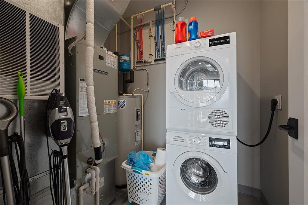 350 Oliver Avenue, Unit 1503 Pittsburgh, PA 15222 - Photo 31 of 43 a utility room with dryer and washer