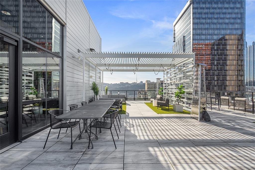 350 Oliver Avenue, Unit 1503 Pittsburgh, PA 15222 - Photo 36 of 43 a view of a swimming pool with a patio