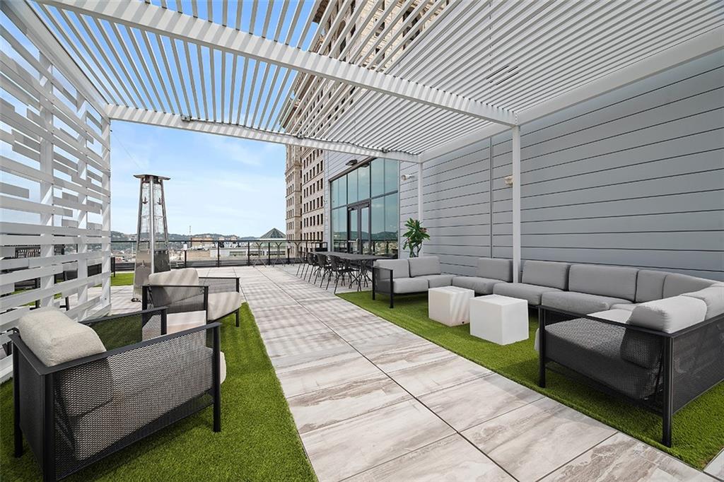 350 Oliver Avenue, Unit 1503 Pittsburgh, PA 15222 - Photo 39 of 43 a view of a patio with couches and potted plants
