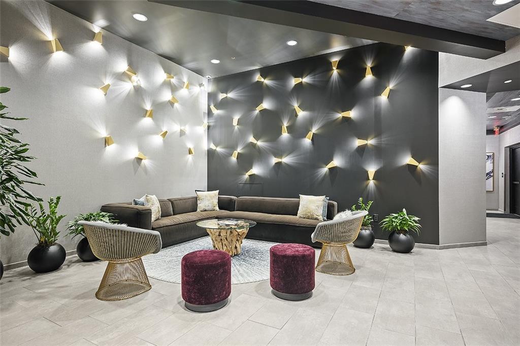 350 Oliver Avenue, Unit 1503 Pittsburgh, PA 15222 - Photo 7 of 43 a dining room with couches lamp and potted plants with sky view