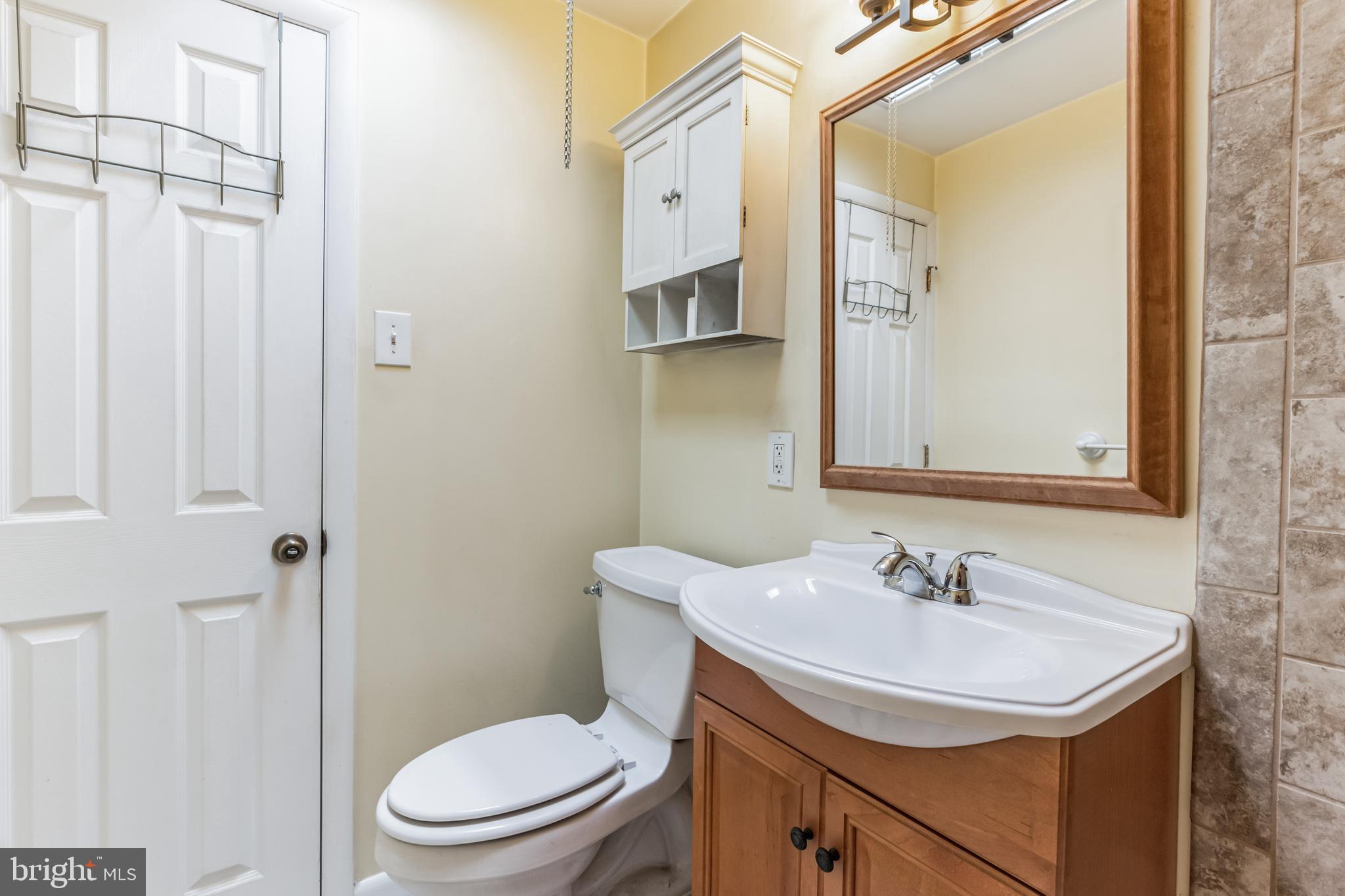 3214 Morning Glory Road Philadelphia, PA 19154 - Photo 14 of 29 a bathroom with a sink toilet and shower