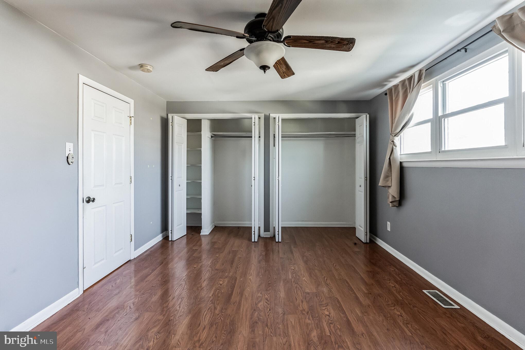 3214 Morning Glory Road Philadelphia, PA 19154 - Photo 18 of 29 wooden floor in an empty room with a window