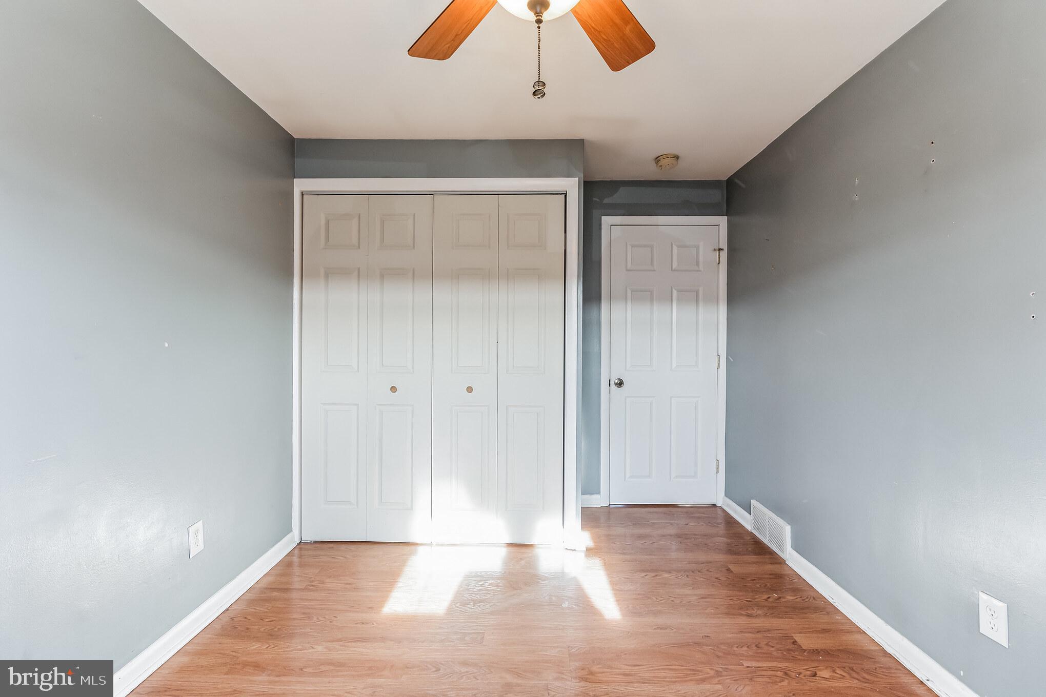 3214 Morning Glory Road Philadelphia, PA 19154 - Photo 23 of 29 a view of an empty room with wooden floor and window