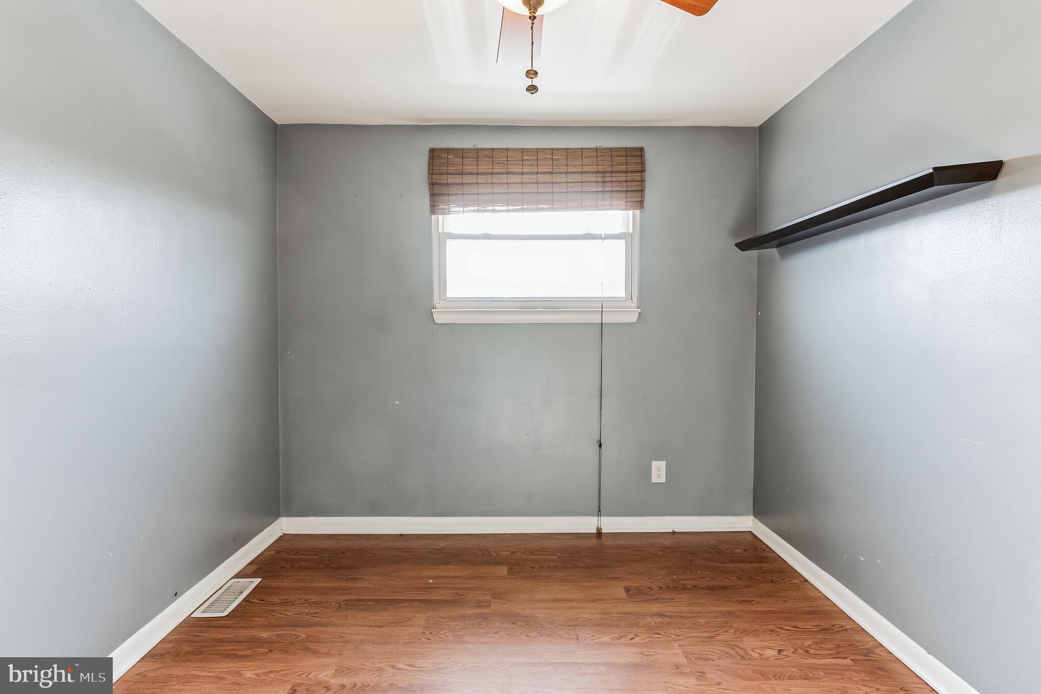 3214 Morning Glory Road Philadelphia, PA 19154 - Photo 24 of 29 a view of an empty room with wooden floor and a window