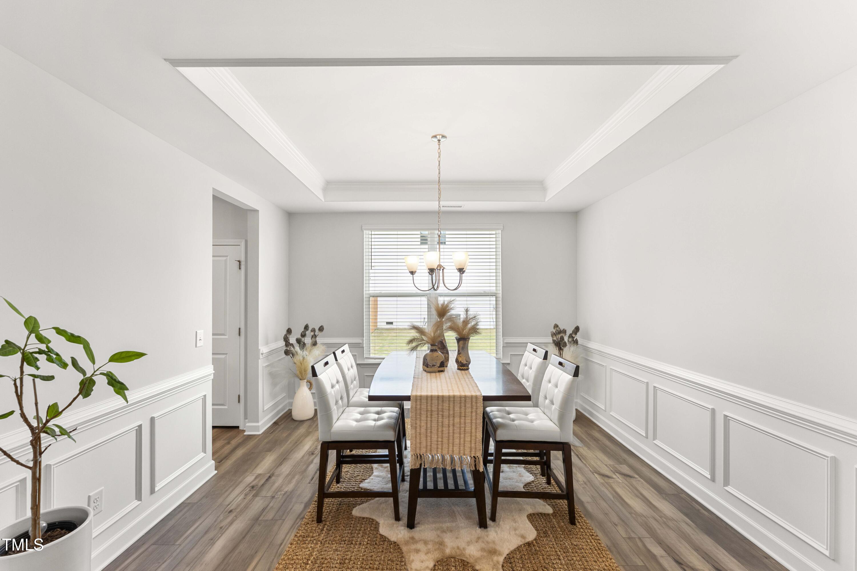 205 Morningside Lane Angier, NC 27501 - Photo 12 of 46 a view of a dining room with furniture window and outside view