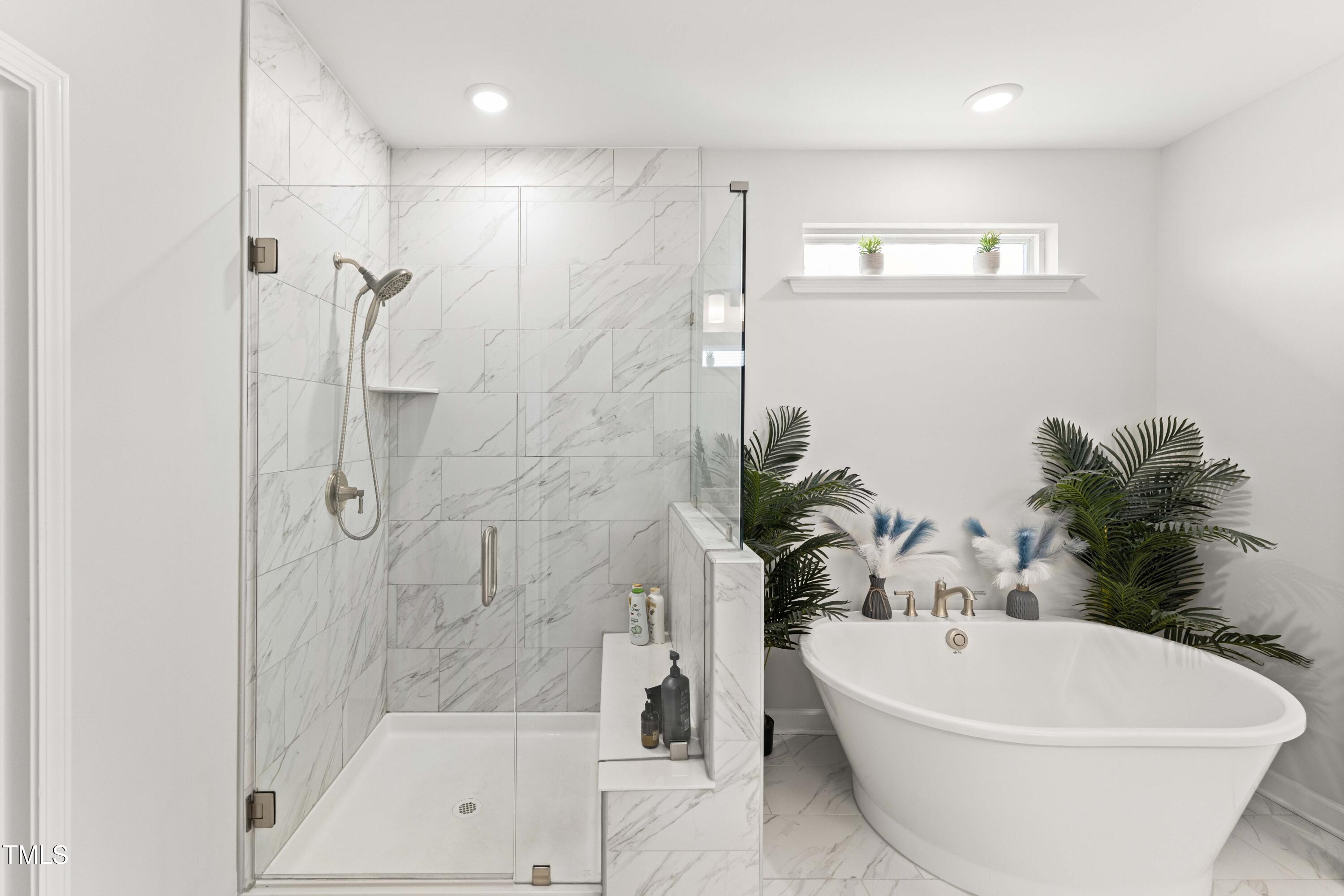 205 Morningside Lane Angier, NC 27501 - Photo 23 of 46 a white bath tub sitting next to a white wall